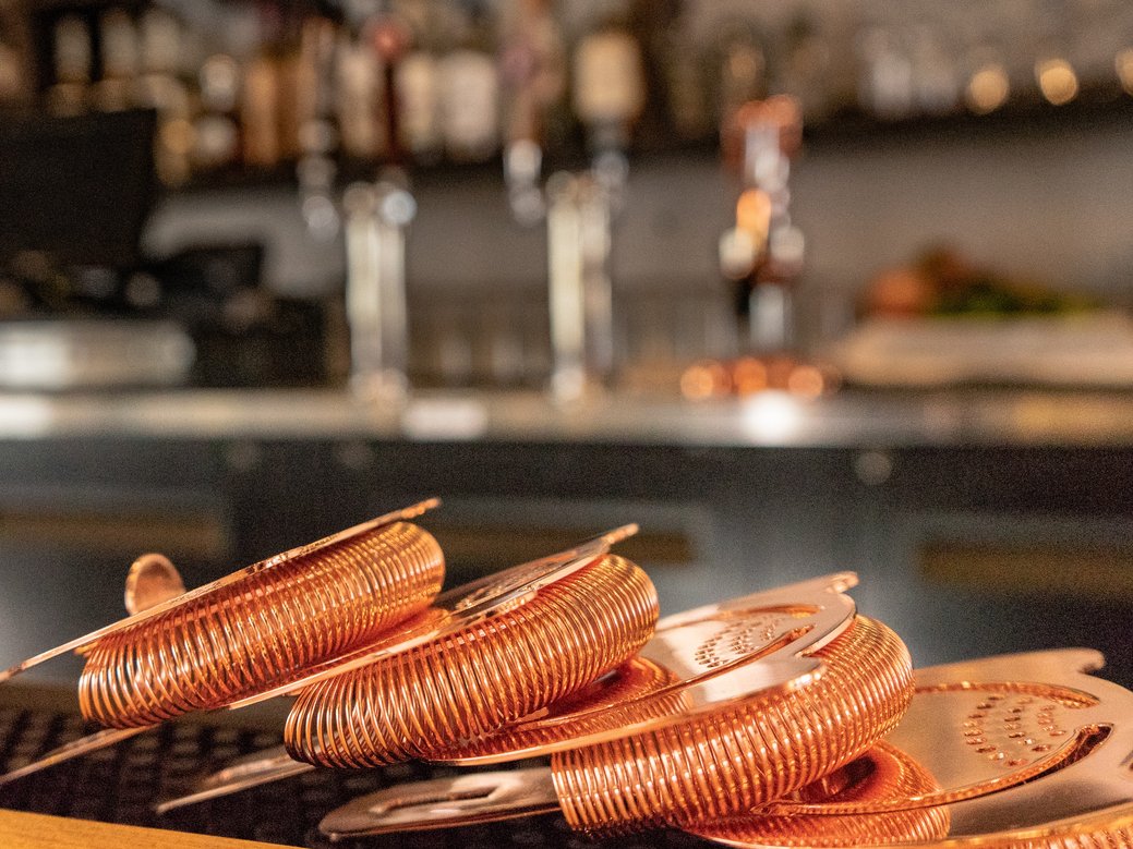 bartender tools on a bar counter